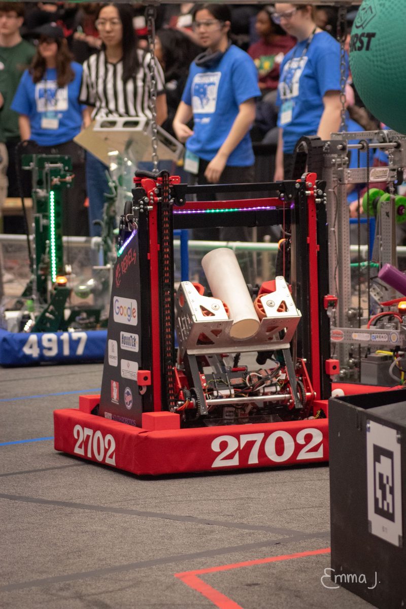 Team 2702's robot on the field at a FIRST Robotics competition